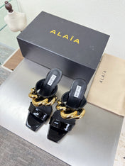 ALAIA 26S DOUBLE STRAP WEDGE SANDALS 110 MM IN BLACK GLOSSY CALFSKIN WITH GOLD HARDWARE