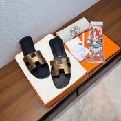 HM 26S ORAN SANDAL IN BLACK AND GOLD CALFSKIN