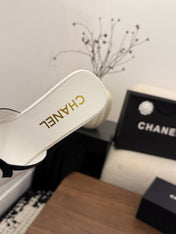 CHANEL 26S WEDGE SANDALS 95 MM IN WHITE CALFSKIN