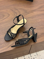 CHANEL 26S HIGH-HEELED BACK-STRAP SANDALS 60 MM IN BLACK WOVEN LAMBSKIN