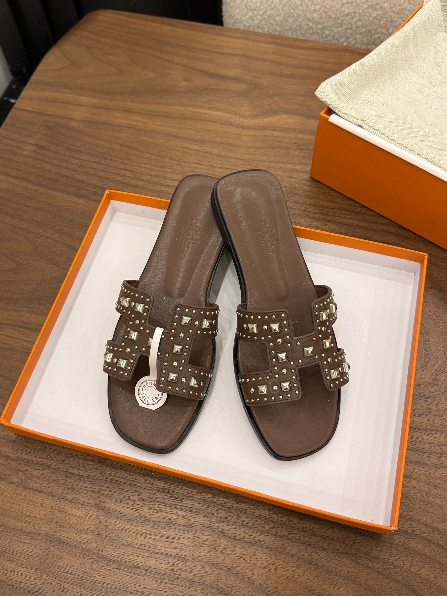 HM 26S ORAN STUDDED SANDALS IN DARK BROWN CALFSKIN