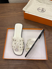 HM 26S ORAN STUDDED SANDALS IN WHITE CALFSKIN