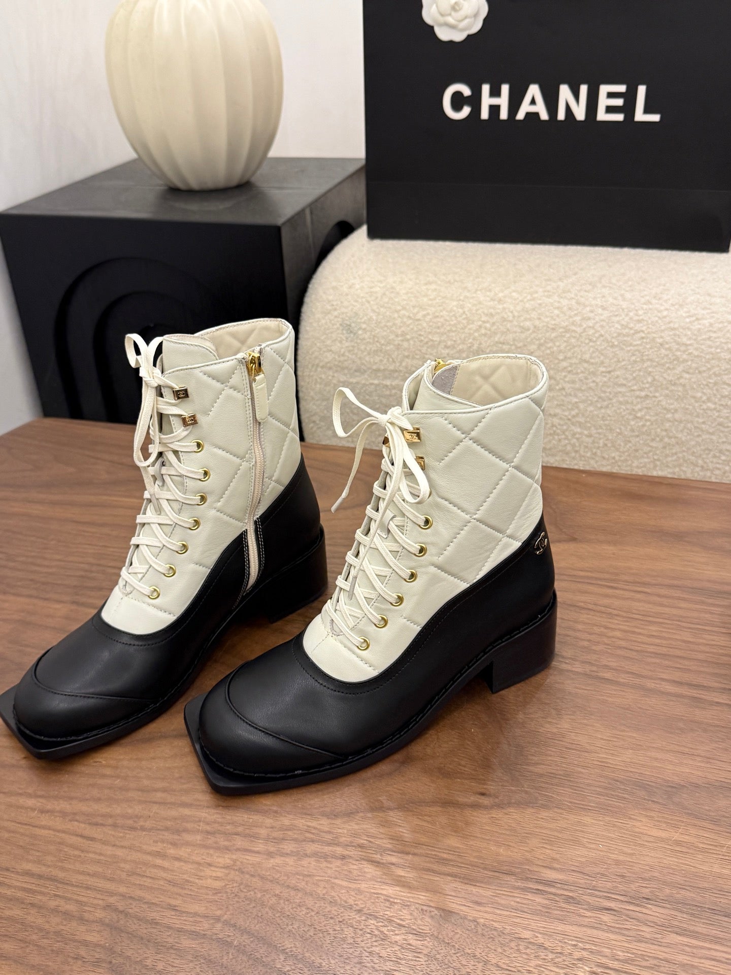 CHANEL 26S LACE UP HIGH TOP BOOTS 45 MM IN BLACK AND WHITE CALFSKIN