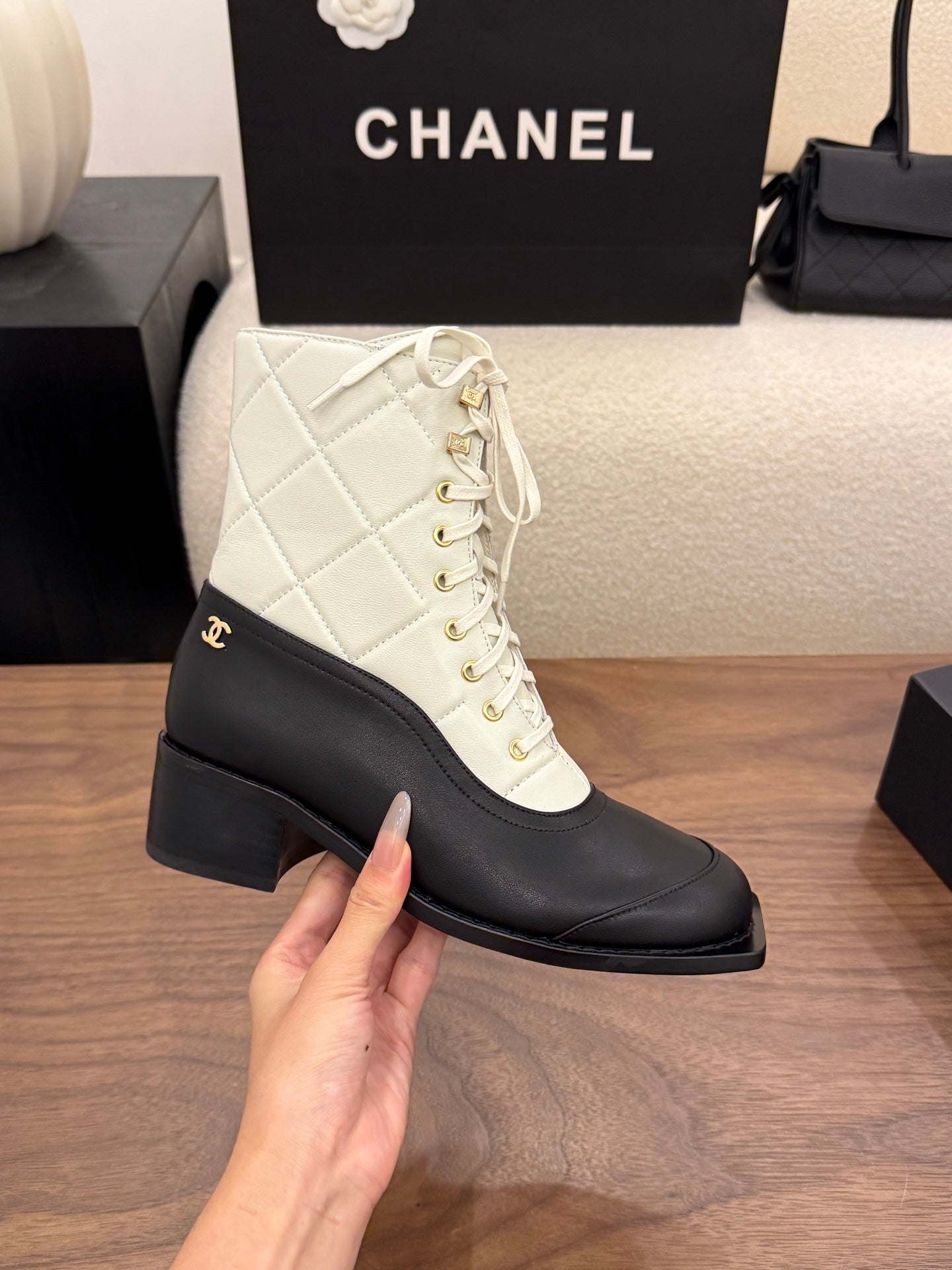 CHANEL 26S LACE UP HIGH TOP BOOTS 45 MM IN BLACK AND WHITE CALFSKIN
