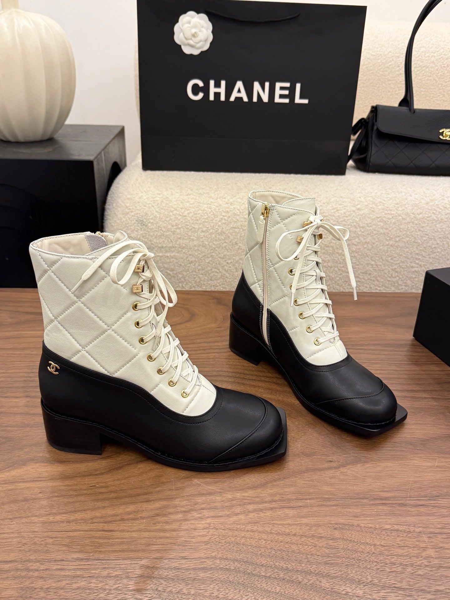 CHANEL 26S LACE UP HIGH TOP BOOTS 45 MM IN BLACK AND WHITE CALFSKIN