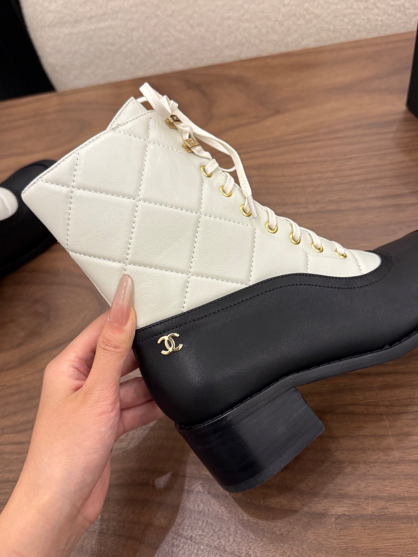 CHANEL 26S LACE UP HIGH TOP BOOTS 45 MM IN BLACK AND WHITE CALFSKIN