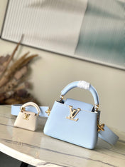 CAPUCINES MINI 21 IN CANDY BLUE TAURILLON GOLD HARDWARE