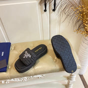 PRADA 26S SLIDE SANDALS IN BLACK LOGO RAFFIA