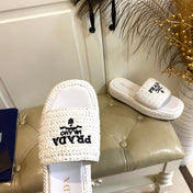PRADA 26S SLIDE SANDALS IN WHITE LOGO RAFFIA