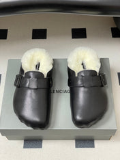 BALENCIAGA 25S FUR-LINED MULES IN BLACK FAUX LEATHER