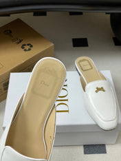 DIOR 26S MULES IN WHITE CALFSKIN WITH BOW