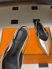 HM 26S NICOLE SLINGBACK IN GOLD CALFSKIN SILVER HARDWARE