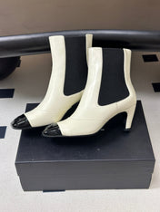 CHANEL 26S ANKLE BOOTS 60 MM IN WHITE CALFSKIN AND BLACK PATENT