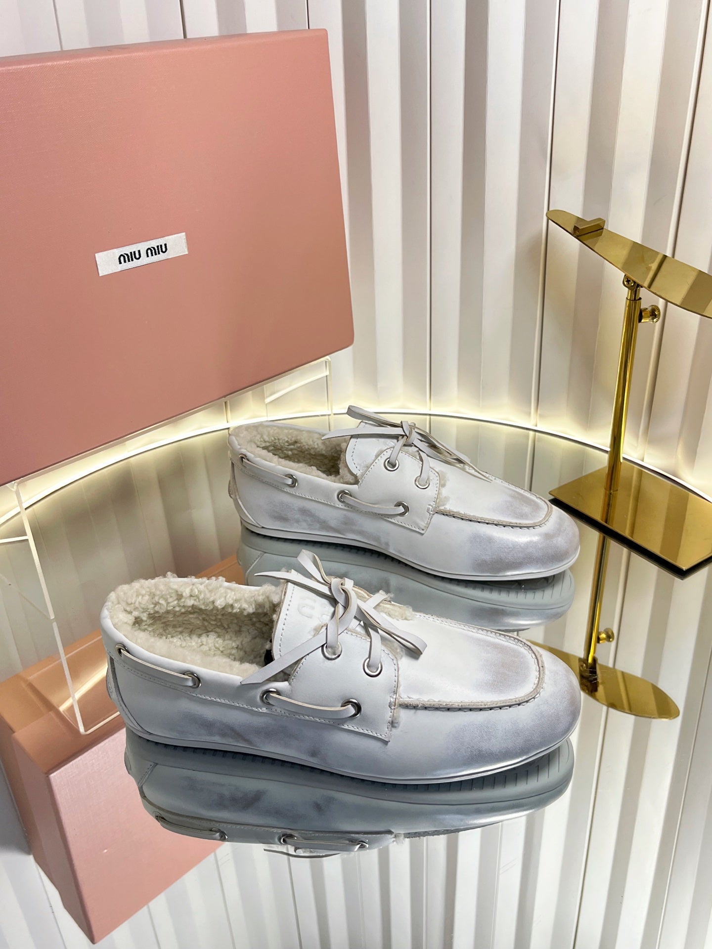 MIUMIU 26S FUR BOAT SHOES IN LIGHT GRAY CALFSKIN