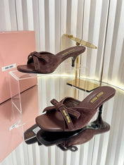 MIUMIU 26S MULE SANDALS 55MM IN DARK BROWN SUEDE WITH BOW