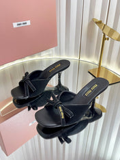 MIUMIU 26S MULE SANDALS 55MM IN BLACK SUEDE WITH BOW