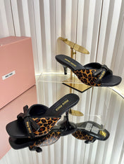 MIUMIU 26S MULE SANDALS 55MM IN LEOPARD PRINT CALF HAIR WITH BOW