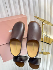 MIUMIU 26S CLOG MULES IN DARK BROWN CALFSKIN