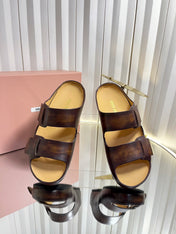 MIUMIU 26S DOUBLE-STRAP SLIDES IN CARAMEL BROWN CALFSKIN