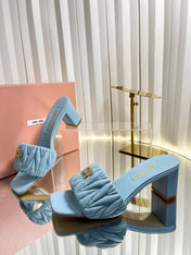 MIUMIU 26S PADDED MATELASSE MULE HEELS 65MM IN LIGHT BLUE CALFSKIN GOLD HARDWARE