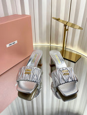 MIUMIU 26S PADDED MATELASSE MULE HEELS 65MM IN SILVER CALFSKIN GOLD HARDWARE
