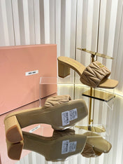 MIUMIU 26S PADDED MATELASSE MULE HEELS 65MM IN BEIGE CALFSKIN GOLD HARDWARE