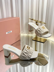 MIUMIU 26S PADDED MATELASSE MULE HEELS 65MM IN LIGHT BEIGE CALFSKIN GOLD HARDWARE