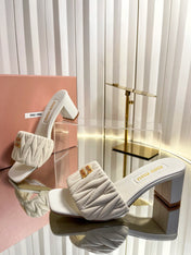 MIUMIU 26S PADDED MATELASSE MULE HEELS 65MM IN LIGHT BEIGE CALFSKIN GOLD HARDWARE