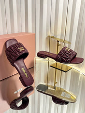 MIUMIU 26S MATELASSE SLIDES IN BURGUNDY RED CALFSKIN GOLD HARDWARE
