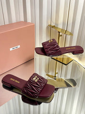 MIUMIU 26S MATELASSE SLIDES IN BURGUNDY RED CALFSKIN GOLD HARDWARE