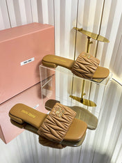 MIUMIU 26S MATELASSE SLIDES IN TAN BROWN CALFSKIN GOLD HARDWARE