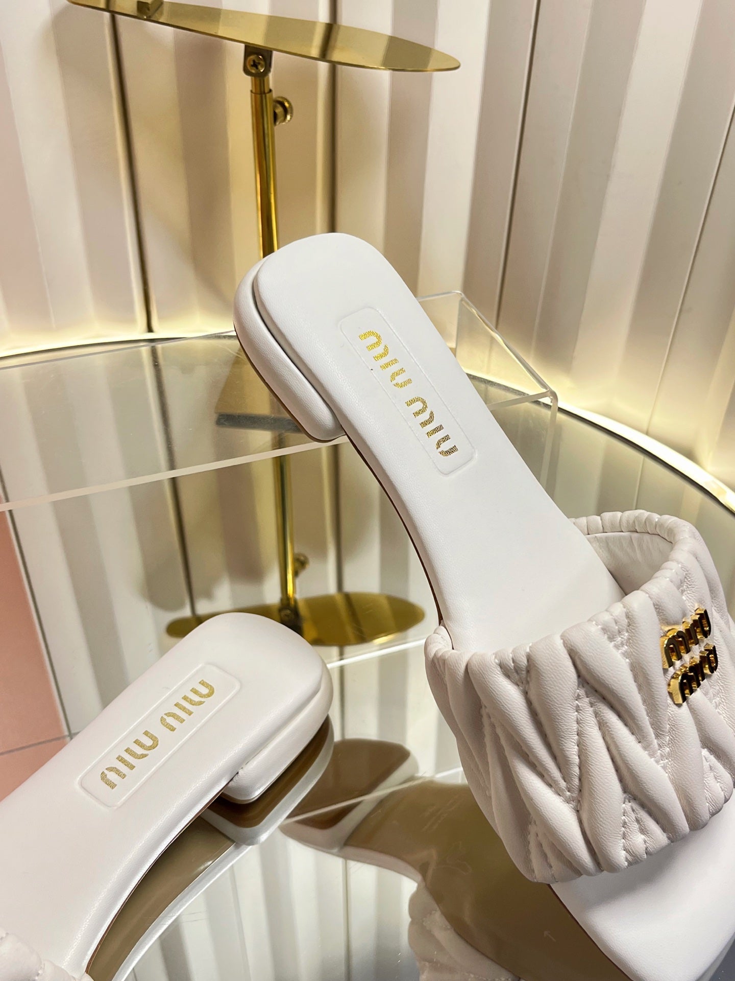 MIUMIU 26S MATELASSE SLIDES IN IVORY WHITE CALFSKIN GOLD HARDWARE