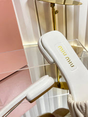 MIUMIU 26S MATELASSE SLIDES IN LIGHT BEIGE CALFSKIN GOLD HARDWARE
