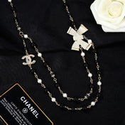 CHANEL 25S CHAIN BELT IN BLACK AND WHITE PEARL 614285