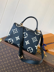 MADELEINE 30 IN BLACK MIX WHITE MONOGRAM CALFSKIN EMBOSSED LOGO
