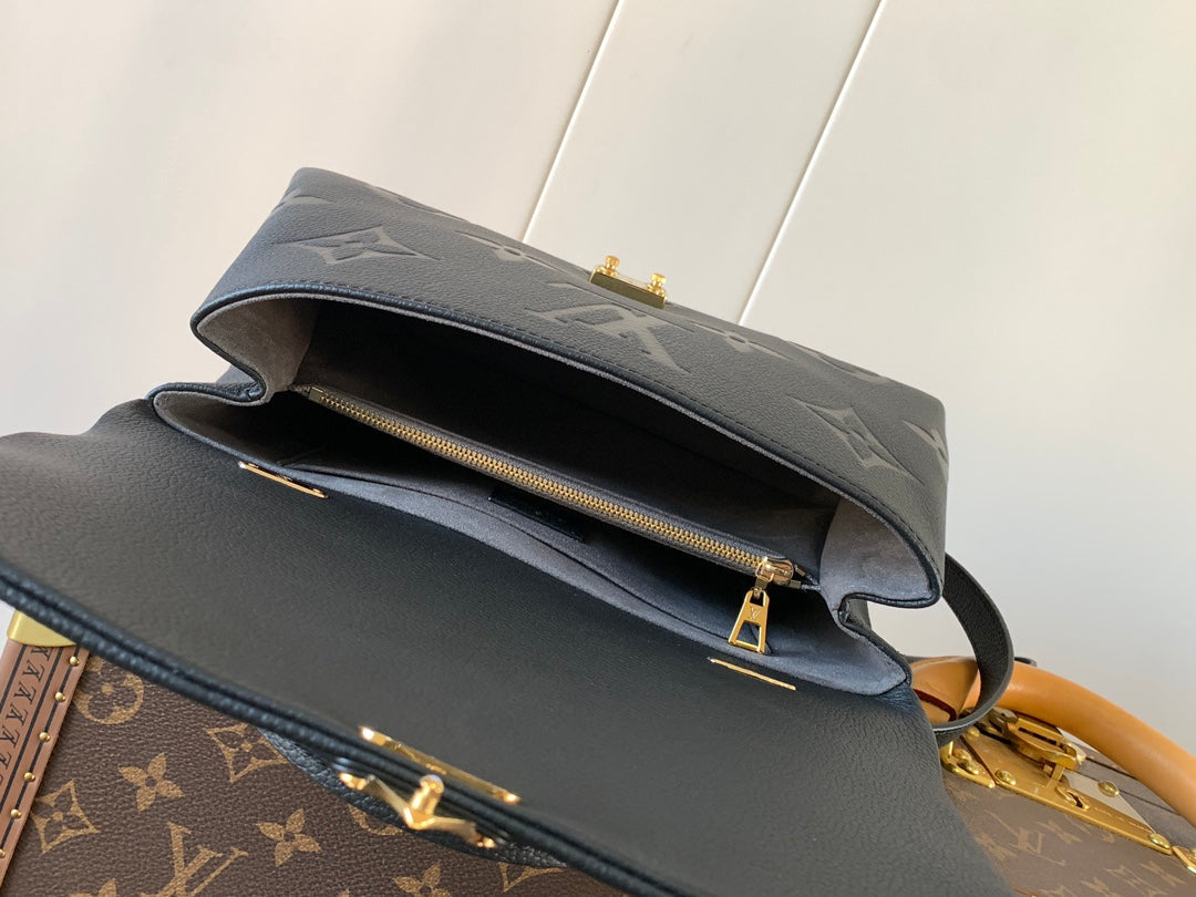 MADELEINE 30 IN BLACK MONOGRAM CALFSKIN EMBOSSED LOGO