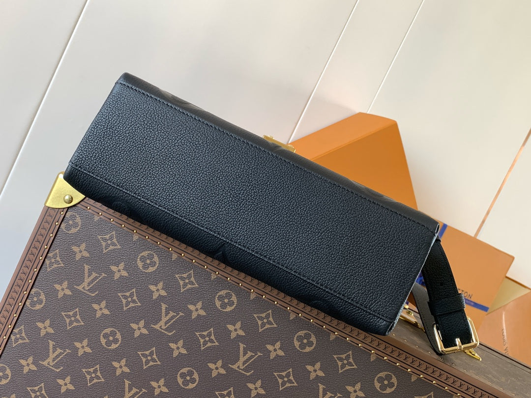 MADELEINE 30 IN BLACK MONOGRAM CALFSKIN EMBOSSED LOGO