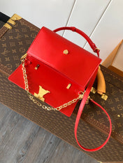 WALLET ON CHAIN CAPUCINES 23 IN RED SMOOTH CALFSKIN GOLD HARDWARE