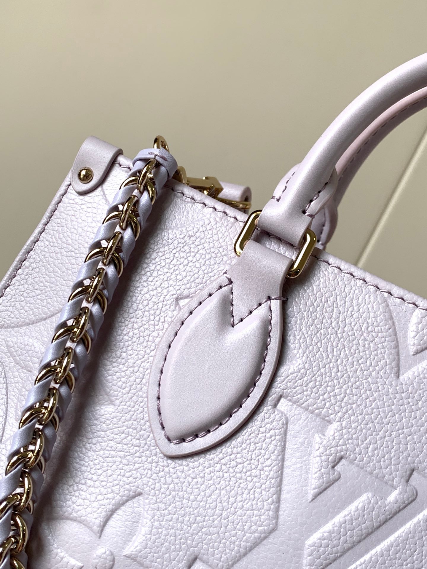 LV 25S ONTHEGO EAST WEST BAG 25 IN LIGHT LAVENDER CALFSKIN MONOGRAM EMPREINTE