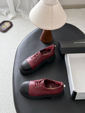 CHANEL 26S LACE UP PLATFORM IN BLACK AND RED CALFSKIN