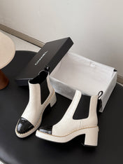 CHANEL 26S CHELSEA ANKLE BOOTS 70 MM  IN WHITE EMBOSSED AND BLACK PATENT