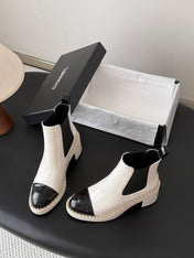 CHANEL 26S CHELSEA ANKLE BOOTS 70 MM  IN WHITE EMBOSSED AND BLACK PATENT