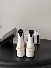 CHANEL 26S CHELSEA ANKLE BOOTS 70 MM  IN WHITE EMBOSSED AND BLACK PATENT