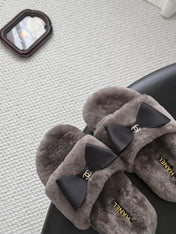 CHANEL 26S SLIDE SANDALS IN GRAY SHEARLING WITH BLACK BOW