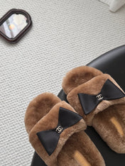 CHANEL 26S SLIDE SANDALS IN BROWN SHEARLING WITH BLACK BOW