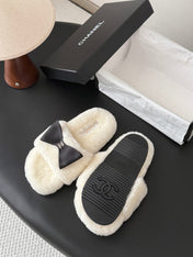 CHANEL 26S SLIDE SANDALS IN WHITE SHEARLING WITH BLACK BOW