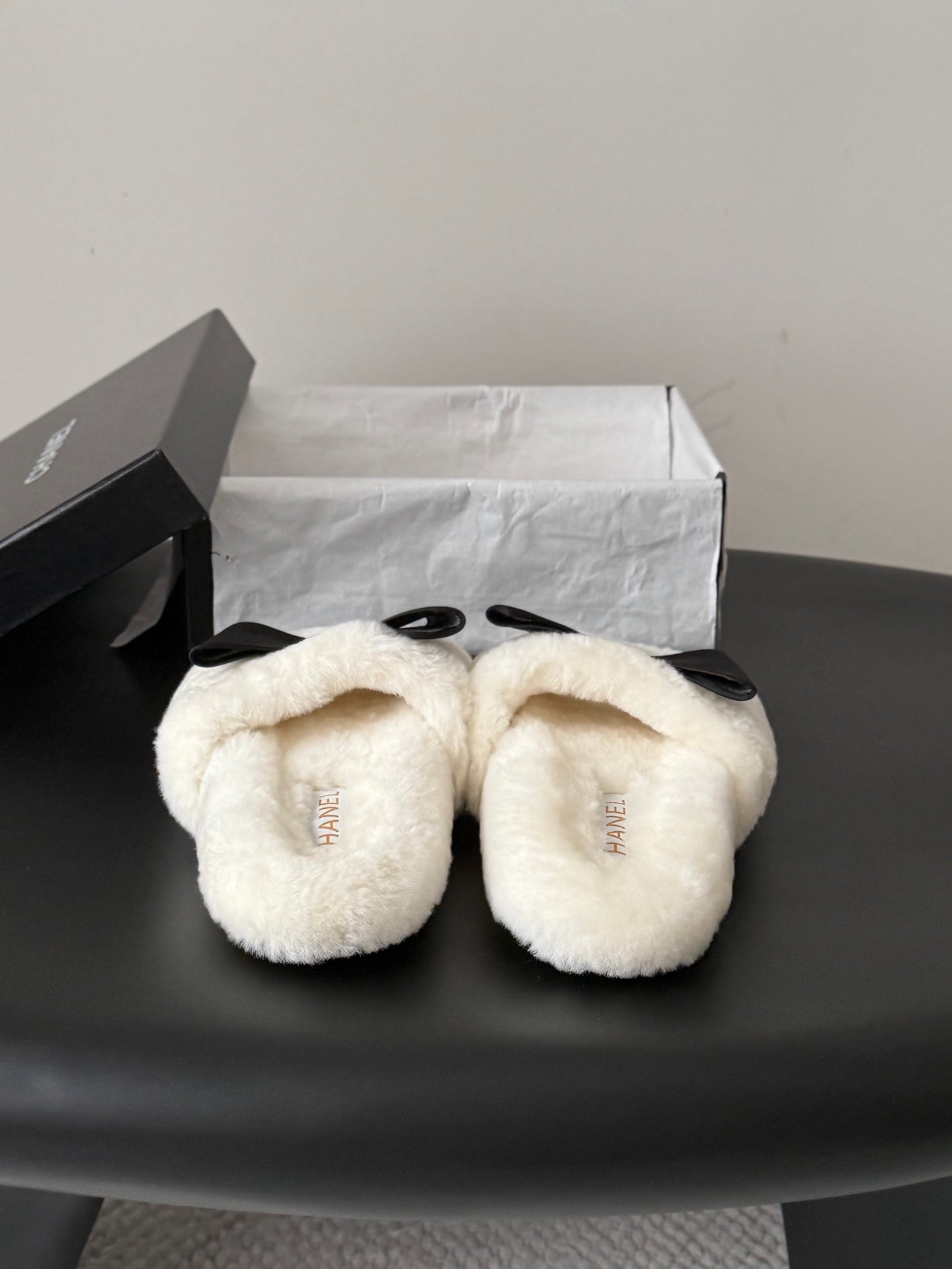 CHANEL 26S SLIDE SANDALS IN WHITE SHEARLING WITH BLACK BOW