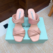 AQUAZZURA 26S TWISTED HEEL SANDALS 85 MM IN LIGHT PINK LAMBSKIN