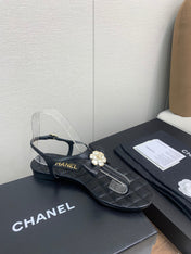 CC THONG SANDAL IN BLACK LAMBSKIN WITH PEARL FLOWER