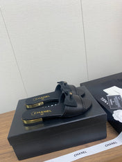 BOW SLIPPERS IN BLACK LAMBSKIN